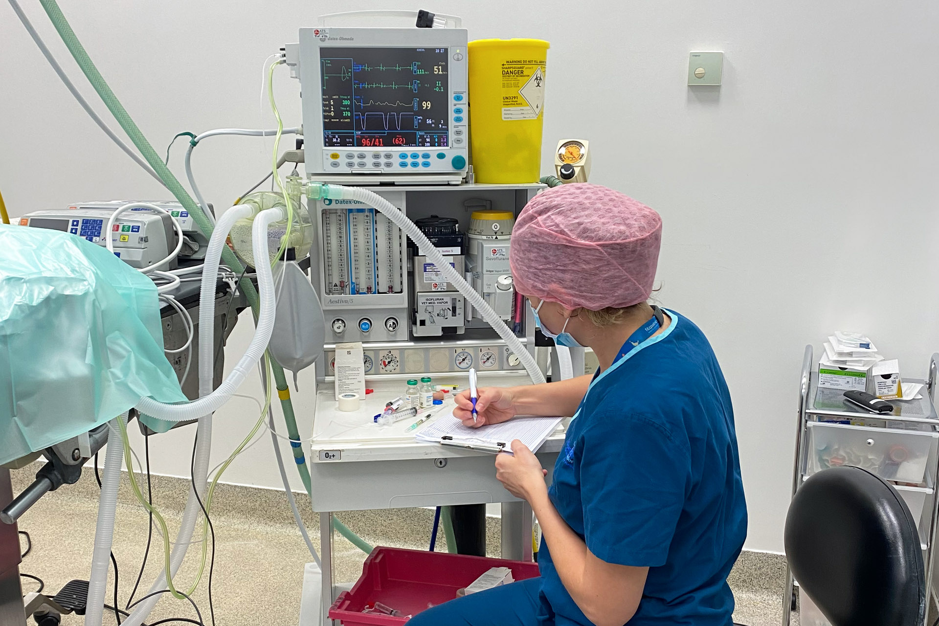 Nurse monitoring a patient's anaesthesia