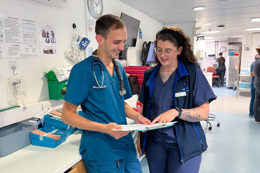 Two Registered Veterinary Nurses discussing a case