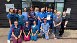Fitzpatrick Referrals team members holding Best Referrals 2026 award outside the practice
