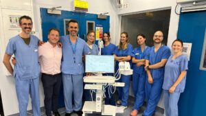 Fitzpatrick Referrals Neurology team members standing with new electrodiagnostic equipment