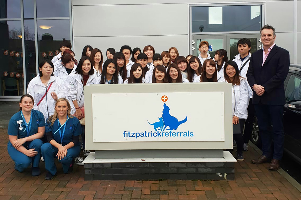 Professor Nick Bacon and veterinary nursing students from Japan outside Fitzpatrick Referrals Oncology & Soft Tissue