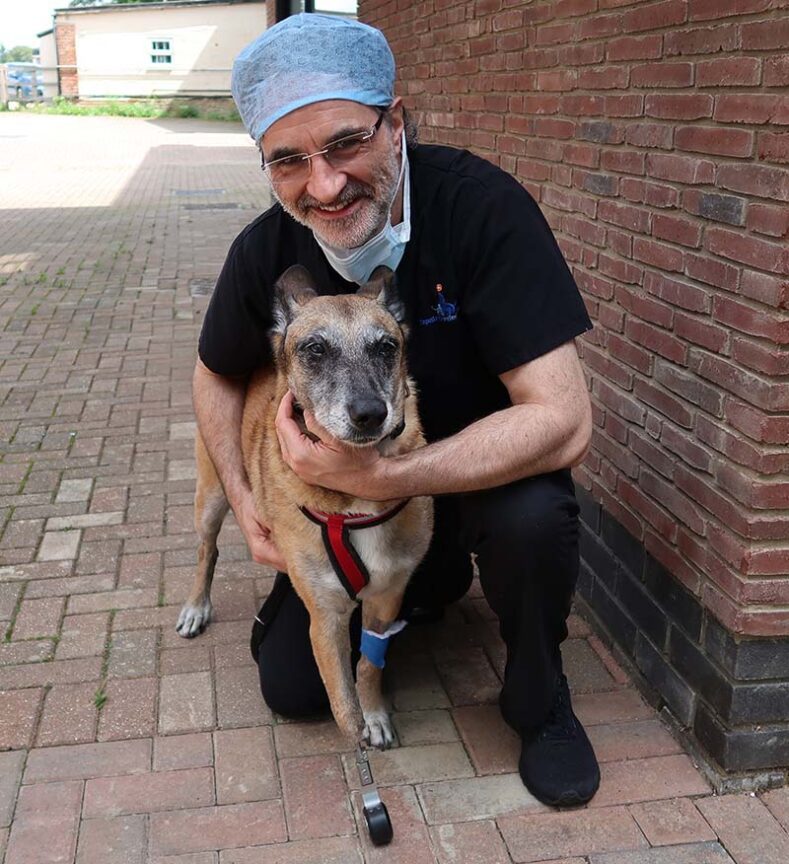 Belgian Professor Noel Fitzpatrick and patient with skateboard wheel amputation prosthesis