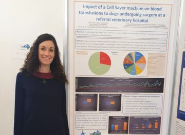 Dr Nuria Comas with research poster