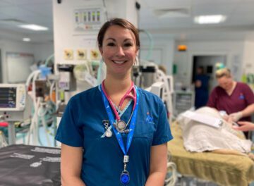 Head Nurse Chloe standing in a busy veterinary practice