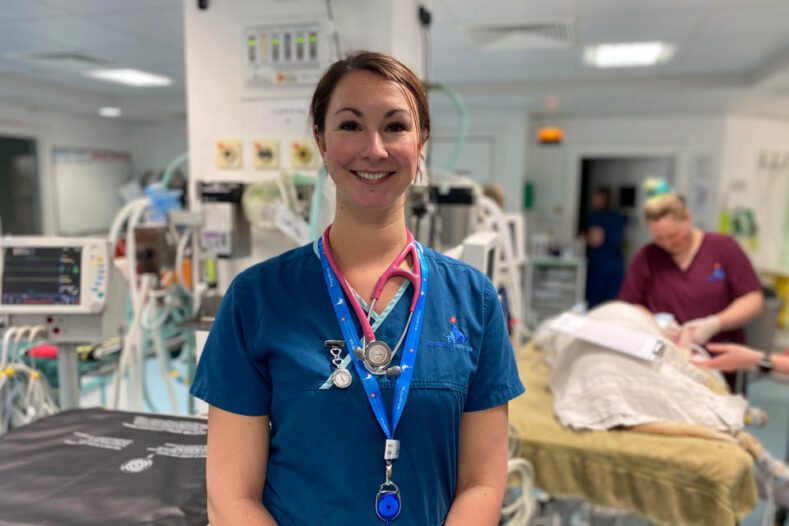 Head Nurse Chloe standing in a busy veterinary practice