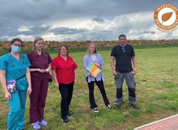 Fitzpatrick Referrals green team standing in field